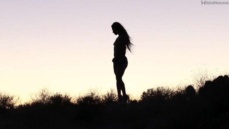 Babe Stare: Sexy Tia girl is nude but only teases in silhouette