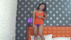 Asian Pussy Vision: Young Asian teen hopping and masturbating in a hotel room