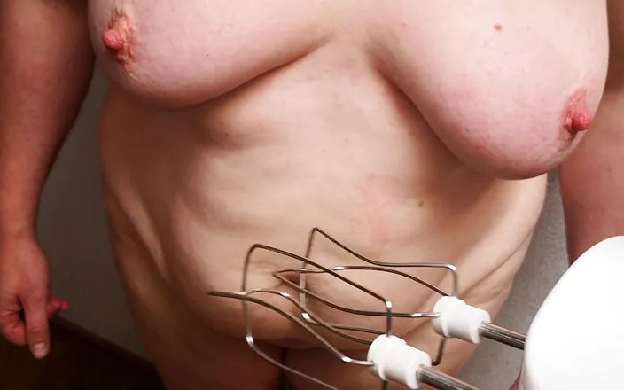 Bouncy Tits Action: Mixing tits with electric mixer