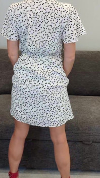 Sadie in a White Dress with Hearts and Red Heels