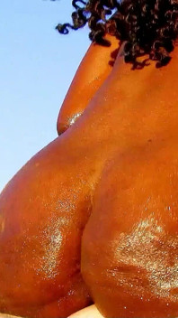 Ebony teen Nancy fucked by strangers on vacation on the beach
