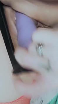 Hot MILF Pleasuring Her Wet Pussy with Dildo in Fishnet Glasses