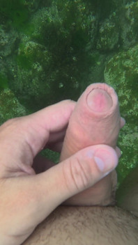 A Teenage Boy Swims Naked in the Sea