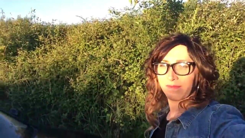 The Midnight Minx: Minx in denim jacket and tartan skirt