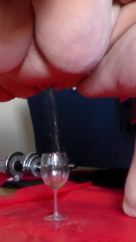 Jen Is Peeing Into a Wineglass