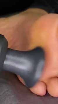Ebony Girl Gives Her Feet a Massage with a Massage Gun