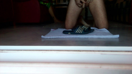 Sex hub male: John is peeing on the bathing slippers on the floor