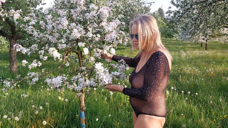 martinawest: Mature Woman Is Walking Around Outside in a See-through Bodysuit!