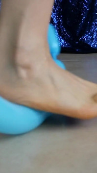 Smushed Harshly by My Classy Bare Feet in Red Toenail Polish Ita