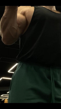 Doing a Biceps Curls with a Straight Barbell