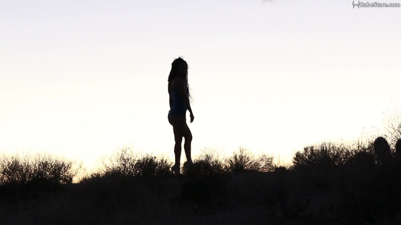 Babe Stare: Sexy Tia girl is nude but only teases in silhouette