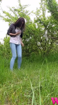Desperate Girl Full Bladder Trying to Pee in the Forest and Smelling the Flowers