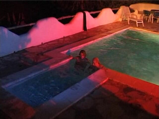 Naughty Girls: Two sexy lesbian chicks are swimming together in the swimming...