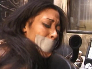 Vintage Fetish: Ebony babe gets whipped while gagged and bound
