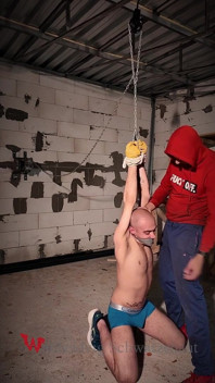 Zeus Suspended in Garage for Ass Spanking