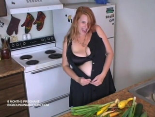 Big Bouncing Boobies: 8 months pregnant in the kitchen