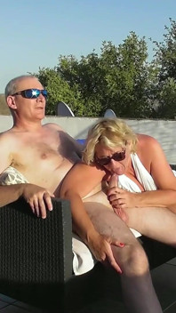 Západ slunce anální stříkání a fisting na balkóně