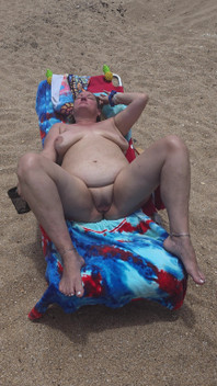Laying with My Shaved Big Pussy Spread Wide Open on the Nude Beach to Tease Those Walking by and Looking BBW Swinger Wife Feet