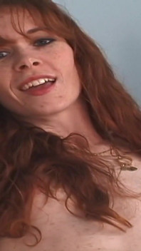 Ginger Newcumer Spreads Her Hairy Pussy