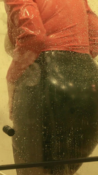 Sexy MILF in latex rubber - Shower striptease