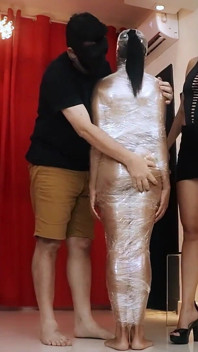 Mummifying Luana with Plastic Wrap and Foot Domination!