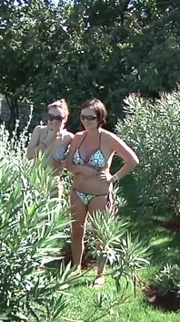 Guy with Mask Pisses on Skinny Brunette and Then Fingers Her and She Blows His Cock