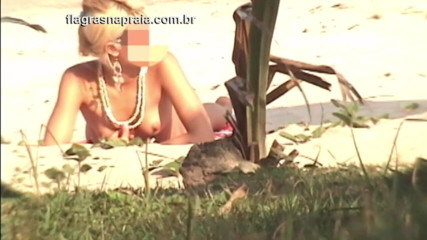 Amateurs videos: Wonderful blonde and brunette take sunbathing naked on a beach...