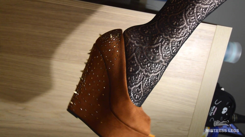 Mistress Legs: My lazy dangling shoe on the feet in black fishnets