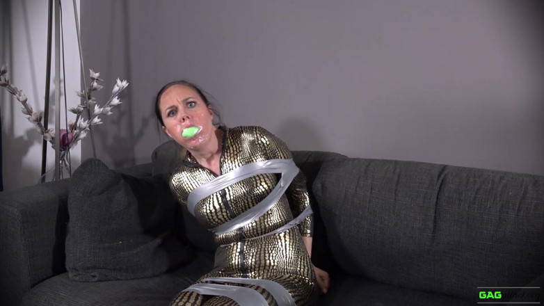 Gag Attack: Leila - unok in catsuit in bondage a nastro