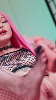 Cutie in Fishnets Doing a Footjob with Fuckmachine