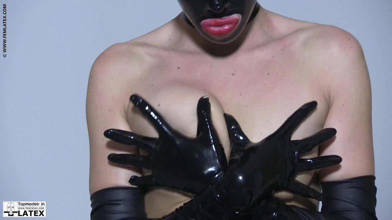 Fem Latex: Busty pornstar hot strip in tight latex catsuit