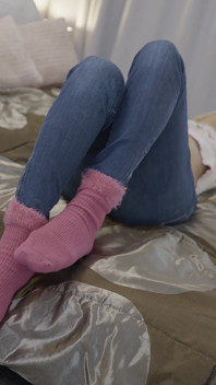 Mature Beauty Teases with Fuzzy Pink Socks