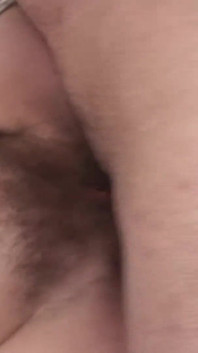 Nice milf with hairy pussy fucking her man on the couch