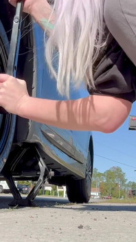 67 Tall Amazon Goddess Changes Her Tire - Big Feet in Frame