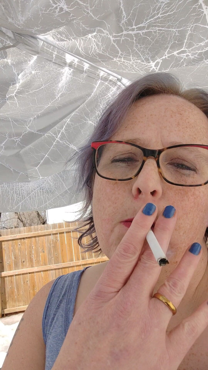 AngYourDirtyCanadian: Calm Outdoor Smoking Moment with a Playful Lipstick Look