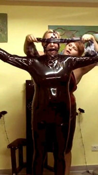 The Slave in Latex - Rough BDSM Action with Three People