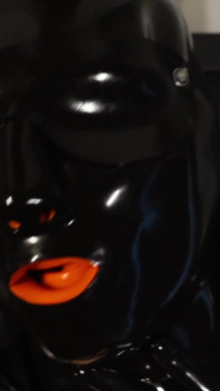 Rubber slut fucking her pussy