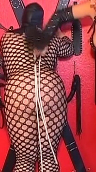 Mature Leather Domme Binds Her Fishnet Slave