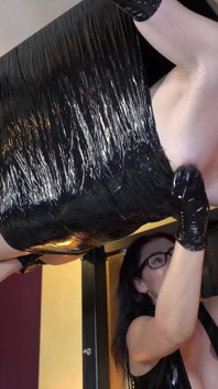 Girl in Hanging Bondage Gets Fucked and Fingered by 2 Femdoms
