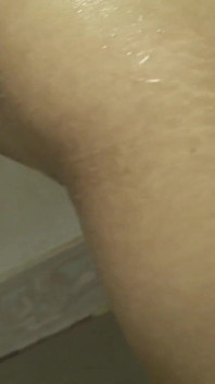 A Skinny Asian Angel Gets Sprayed with Cum and Then with Water in the Shower