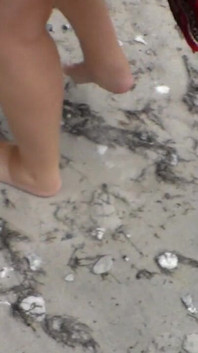 Jen Shows up Her Naked Feet in the Sand