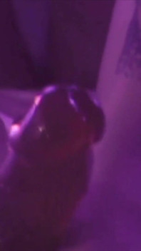 Young Girl Using Her Feet to Play with the Dildo While Masturbating