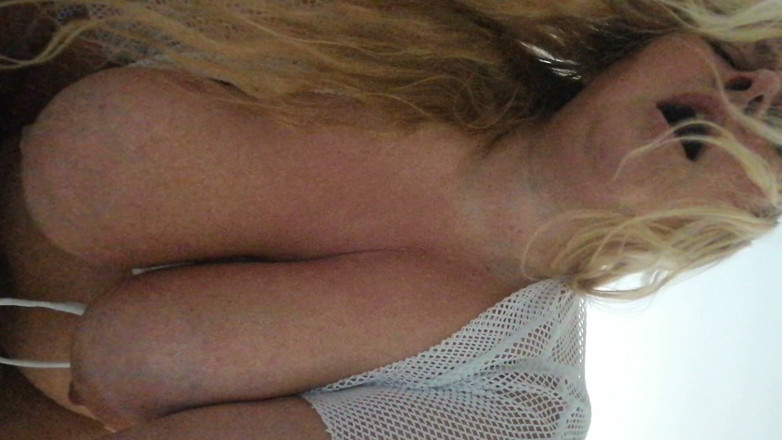 Kitty Queen: Kitty Queen Teasing and Flashing Her Ample Assets and Using...