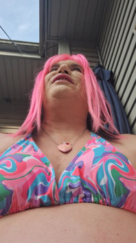 Sitting Outside Sunbathing and Teasing Men!