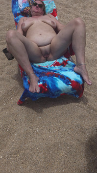 Laying with My Shaved Big Pussy Spread Wide Open on the Nude Beach to Tease Those Walking by and Looking BBW Swinger Wife Feet