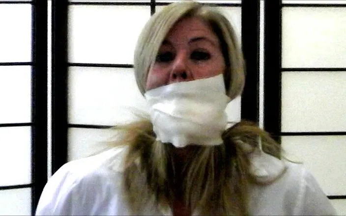 Selfgags classic: Bondage gear seller's gag demonstration!