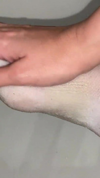 Fußölmassage in knöchelsocken