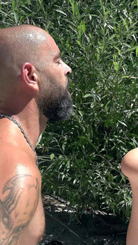 Tattooed MILF Gets Surprised While Sunbathing