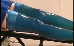 Latex clad babe doing bondage with friend