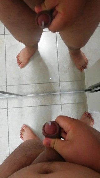 Cock vids and only cock vids.: Chubby guy wanking his little cock in the mirror